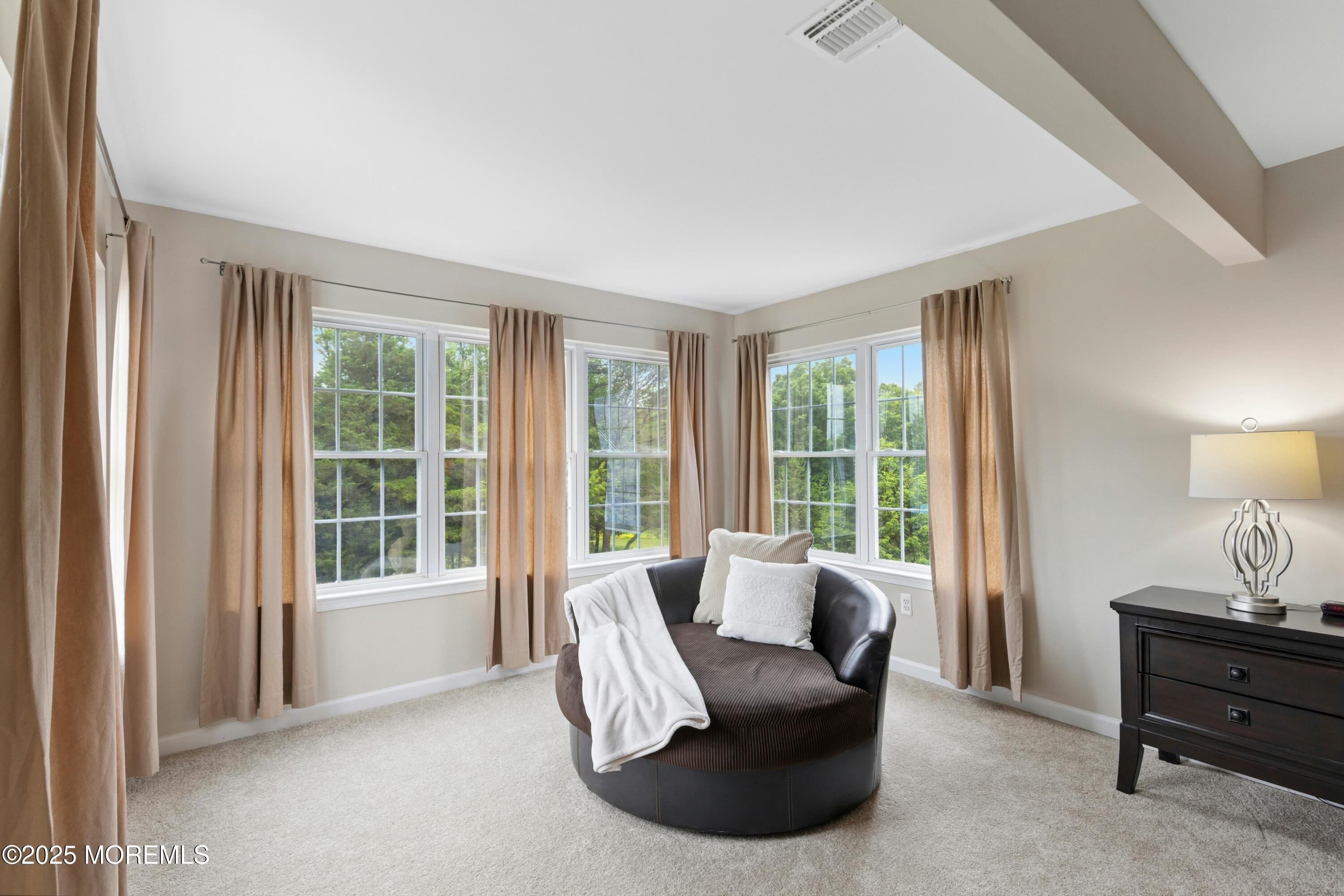 7 Topaz Drive Jackson, NJ 08527 - Photo 28 of 51 a living room with furniture and a window