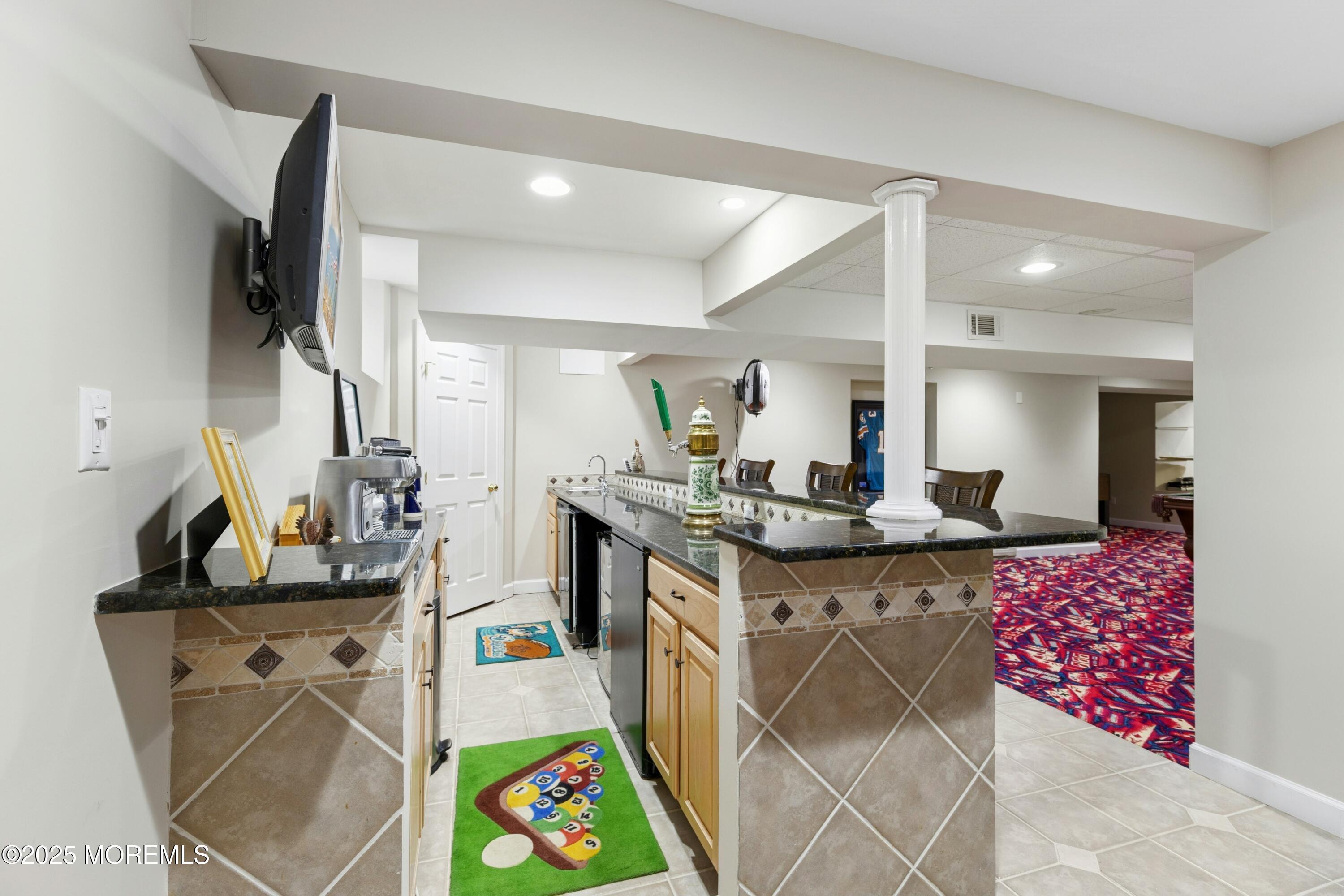 7 Topaz Drive Jackson, NJ 08527 - Photo 36 of 51 a kitchen with a sink stove and cabinets
