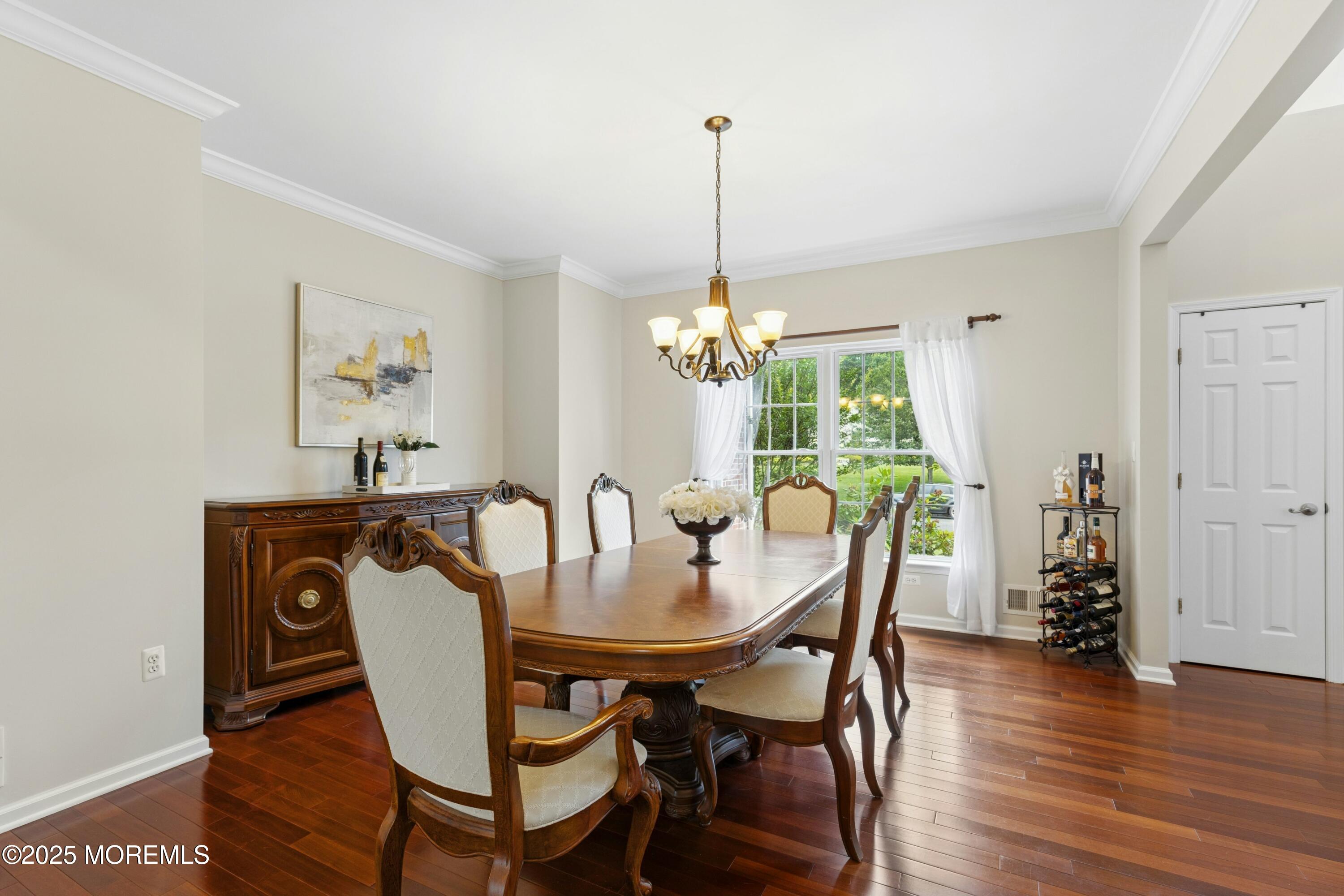 7 Topaz Drive Jackson, NJ 08527 - Photo 7 of 51 a view of a dining room with furniture window and wooden floor