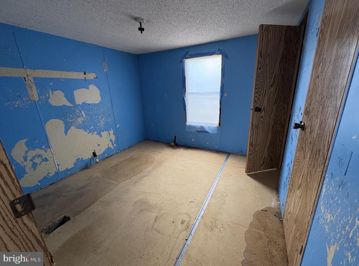115 Tower Circle Carlisle, PA 17013 - Photo 6 of 9 a bedroom with a bed and a window