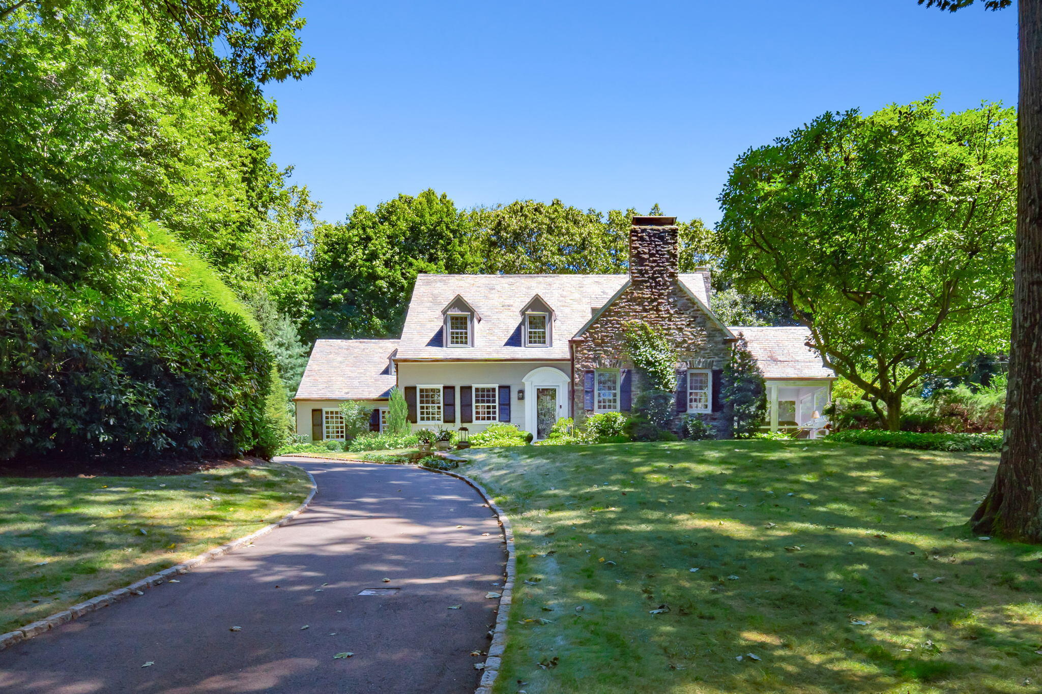 7 Point O Woods Road South Darien, CT 06820 - Photo 1 of 33 a front view of a house with a yard
