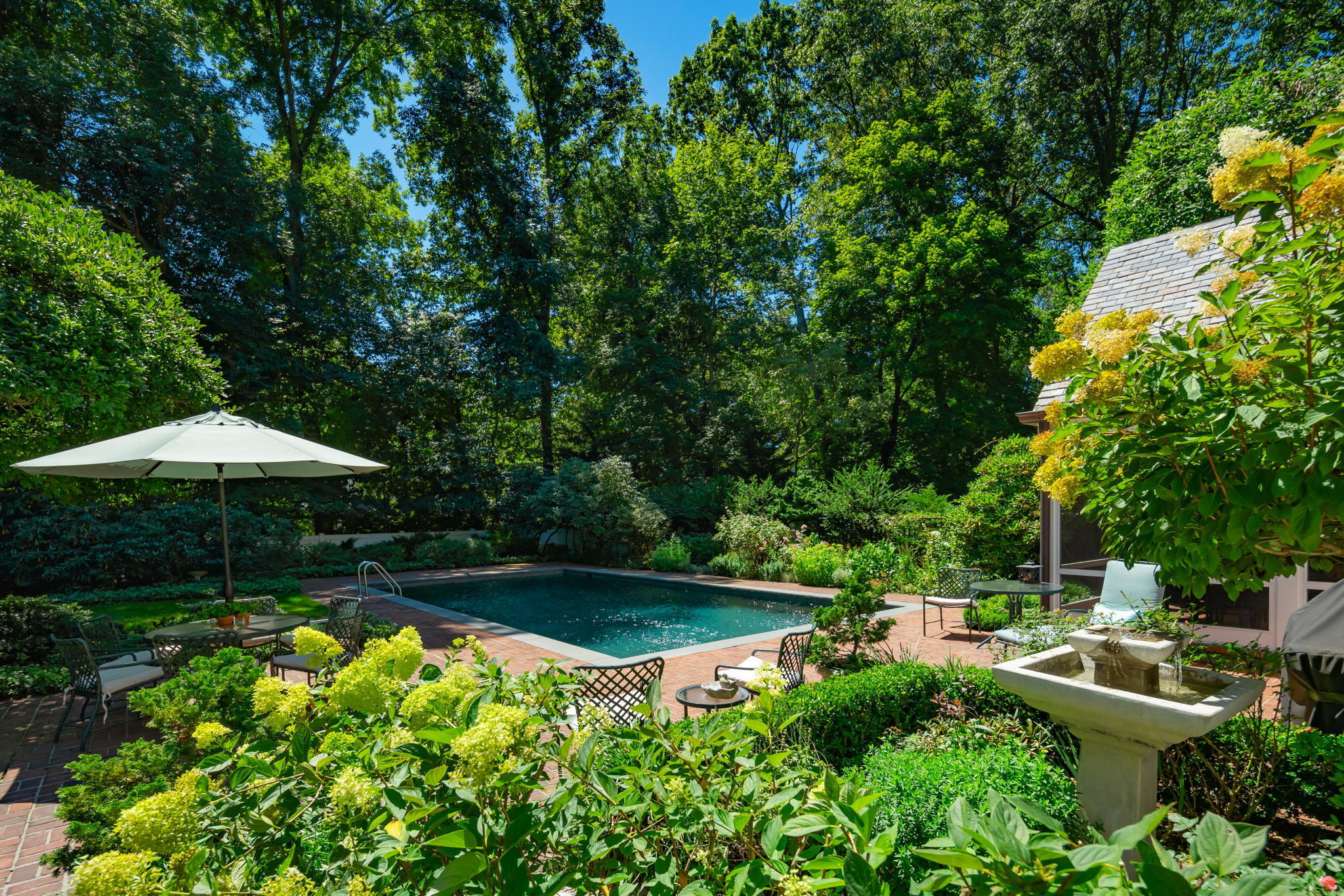 7 Point O Woods Road South Darien, CT 06820 - Photo 13 of 33 a view of backyard with outdoor seating and green space