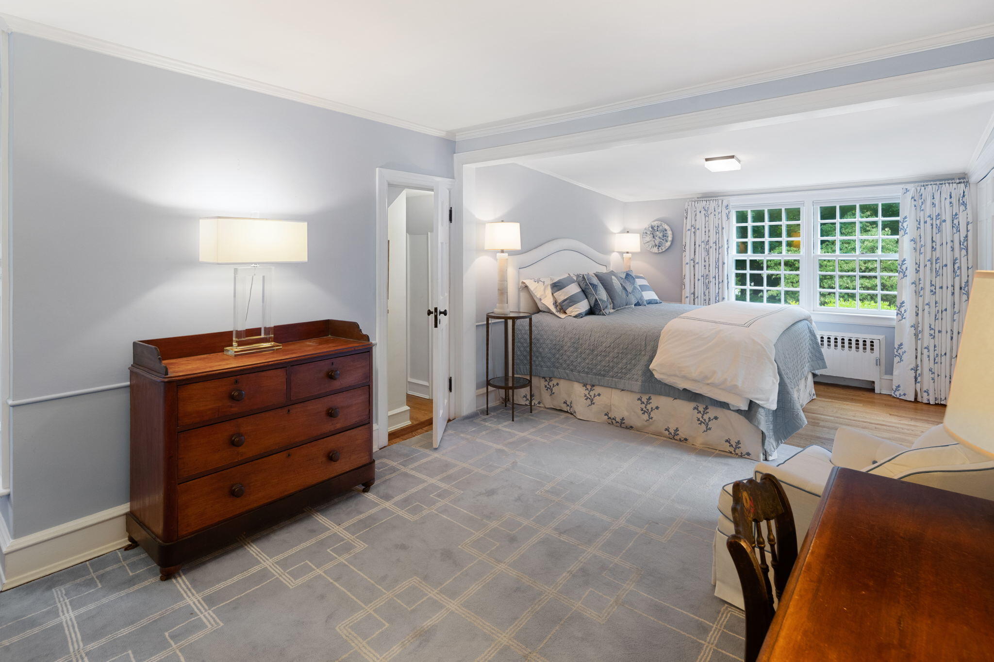 7 Point O Woods Road South Darien, CT 06820 - Photo 24 of 33 a bed room with a bed and a chair