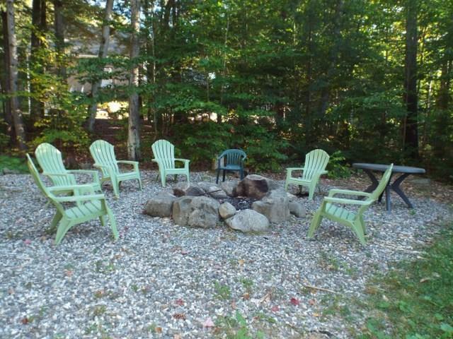 74 Beach Road Naples, ME 04055 - Photo 8 of 30 Fire pit in front yard