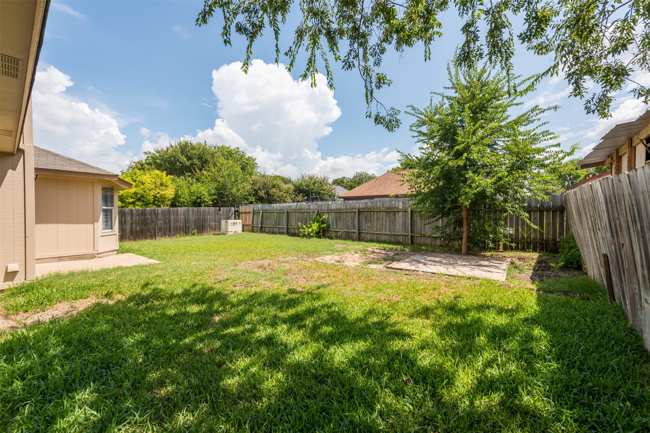 5703 Teri Road Austin, TX 78744 - Photo 16 of 16 a view of a backyard