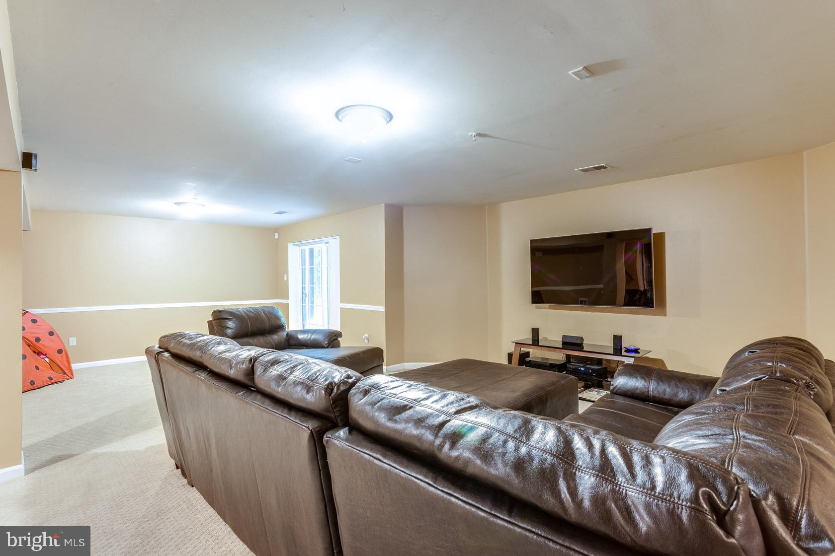 12408 Spring Ridge Court Laurel, MD 20708 - Photo 23 of 29 2nd FAMILY ROOM LOWER LVL W/ WALKOUT TO PATIO