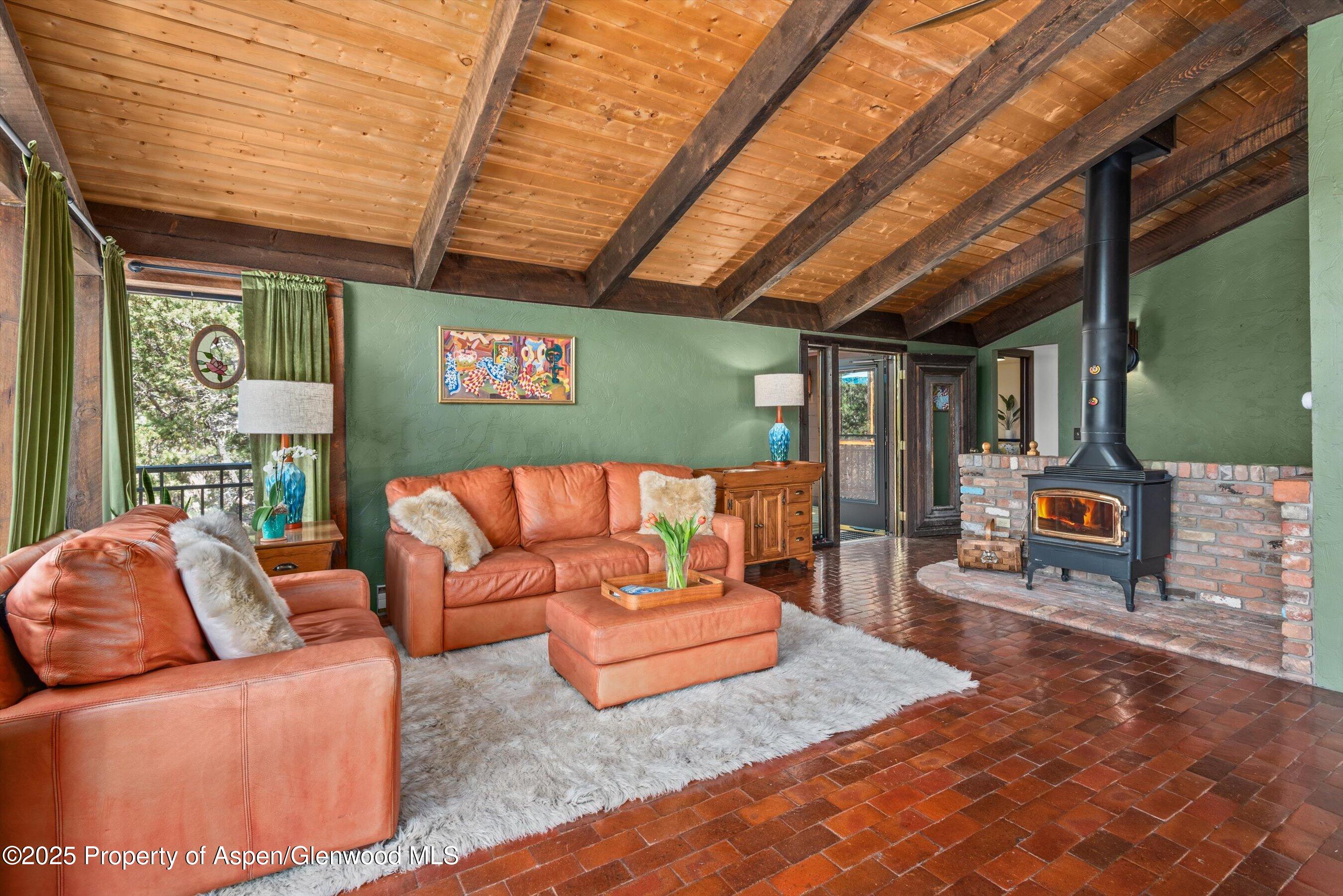 679 Pinon Drive Basalt, CO 81621 - Photo 18 of 52 a outdoor living space with furniture and a flat screen tv