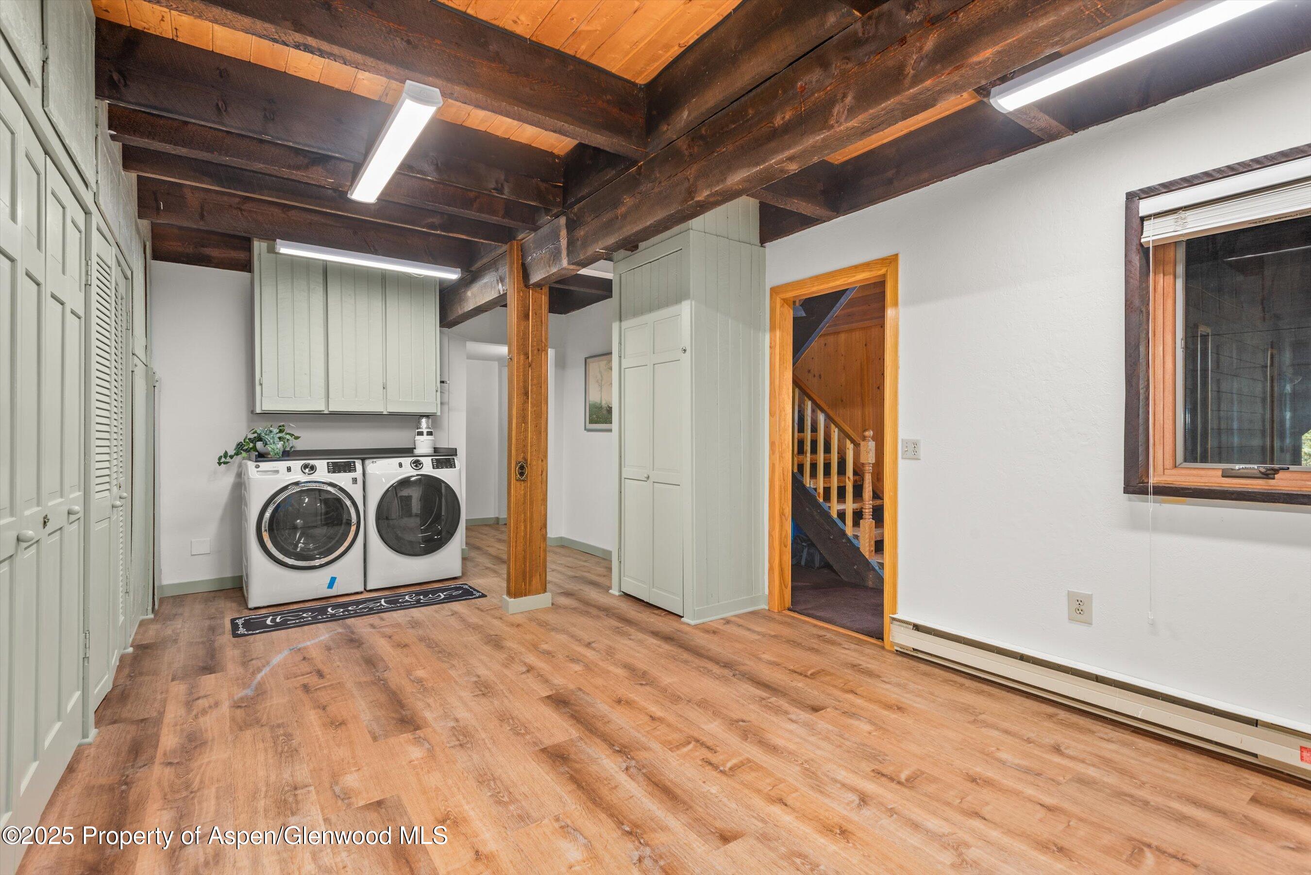 679 Pinon Drive Basalt, CO 81621 - Photo 43 of 52 a view of a storage and utility room with a washer and dryer