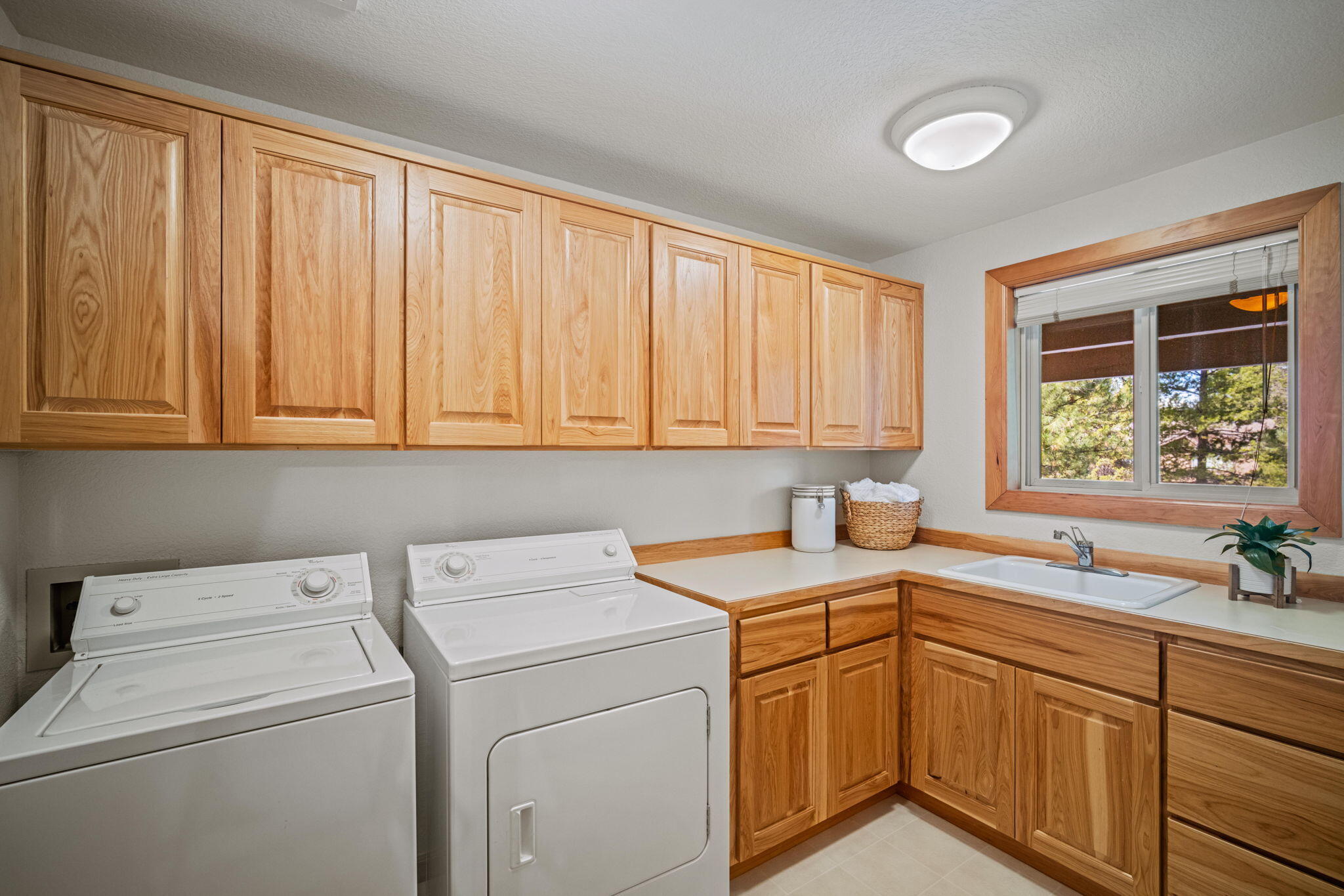17948 Shadow Lane, Unit 7 Sunriver, OR 97707 - Photo 67 of 92 a view of a storage and utility room with washer and dryer