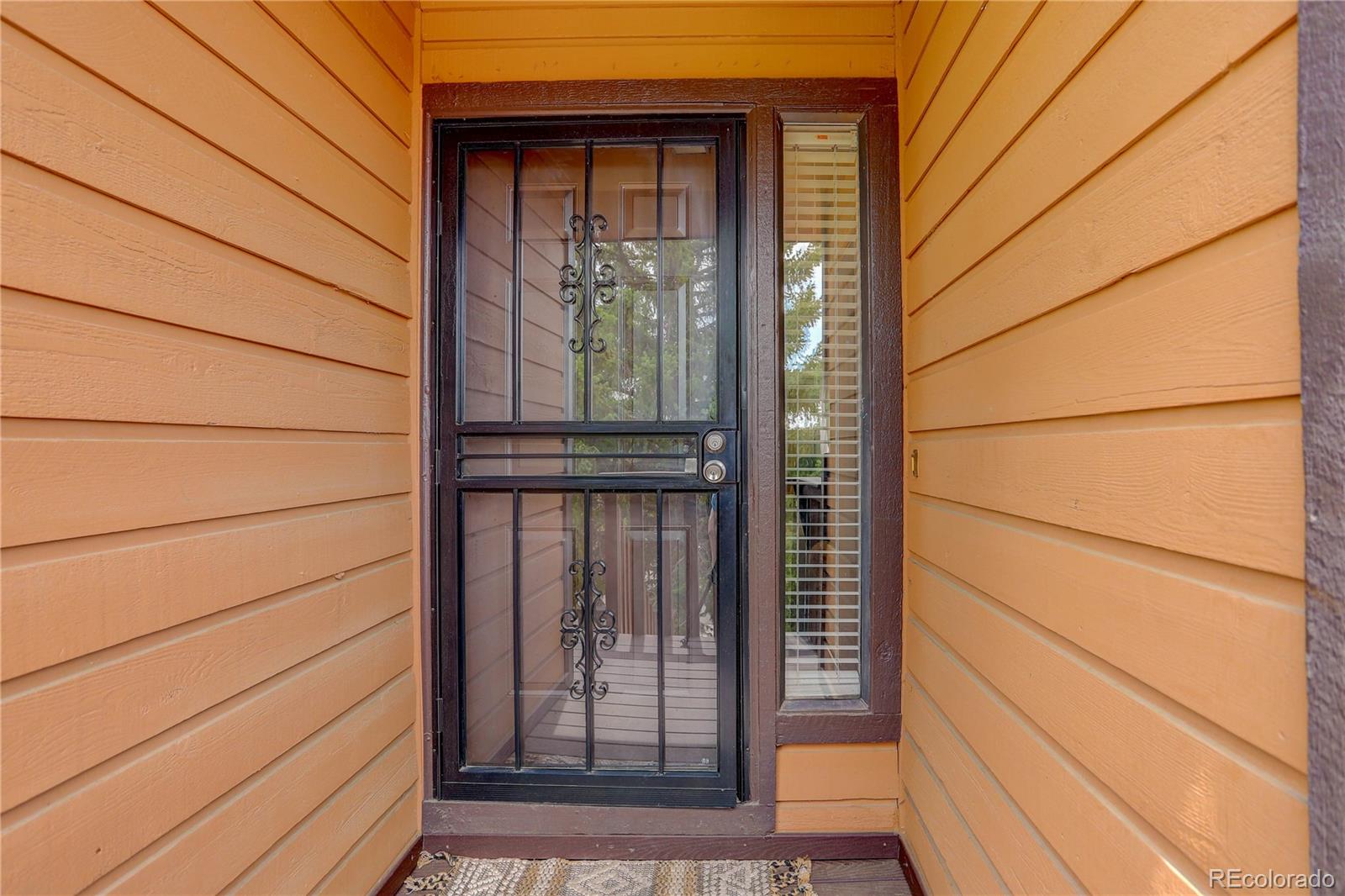 9413 West 89th Circle Westminster, CO 80021 - Photo 4 of 32 a view of front door