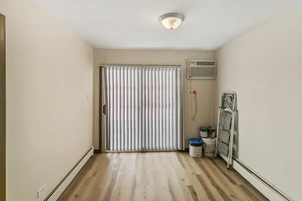 an entryway with a window in a room