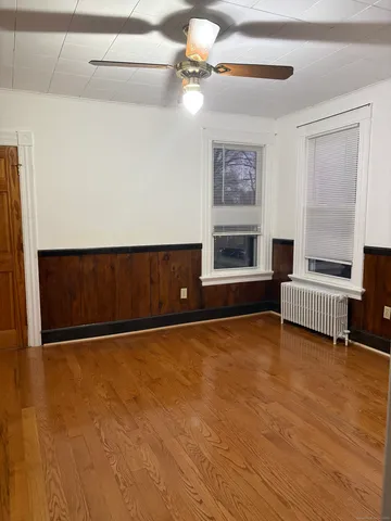 a view of a room with a large window