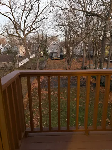 a bathroom with a toilet and a bathtub