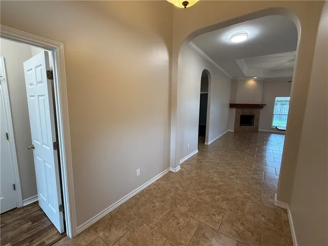 wooden floor in a hall with an entryway
