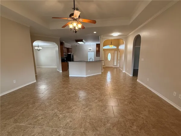 a view of a hallway with a chandelier