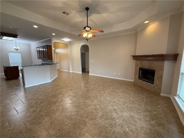 a view of a livingroom with a kitchen