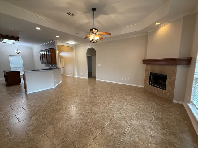 a view of a livingroom with a kitchen