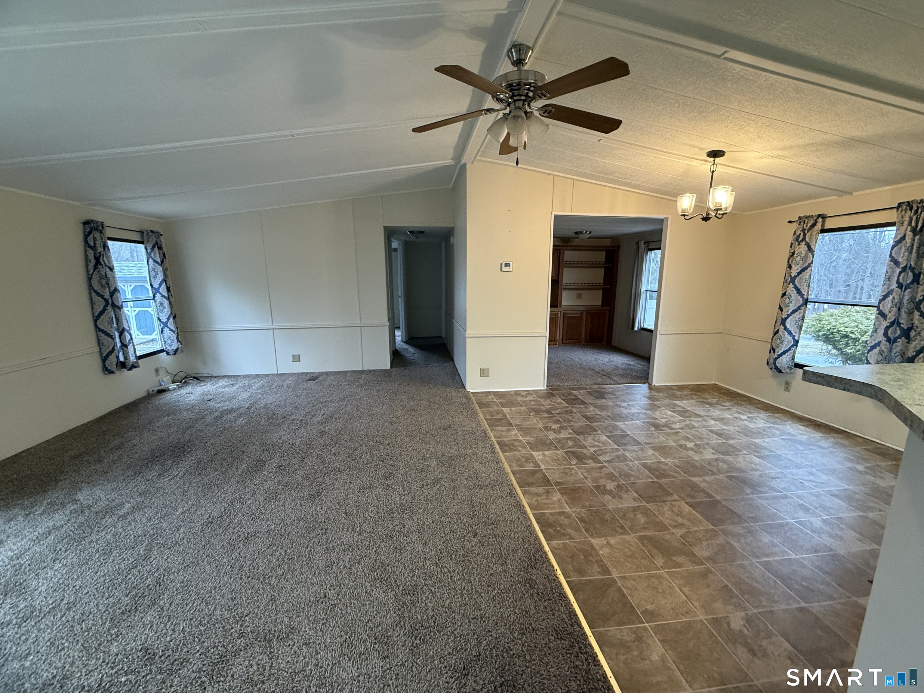 183 Whalehead Road Ledyard, CT 06335 - Photo 13 of 24 an empty room with fan and windows