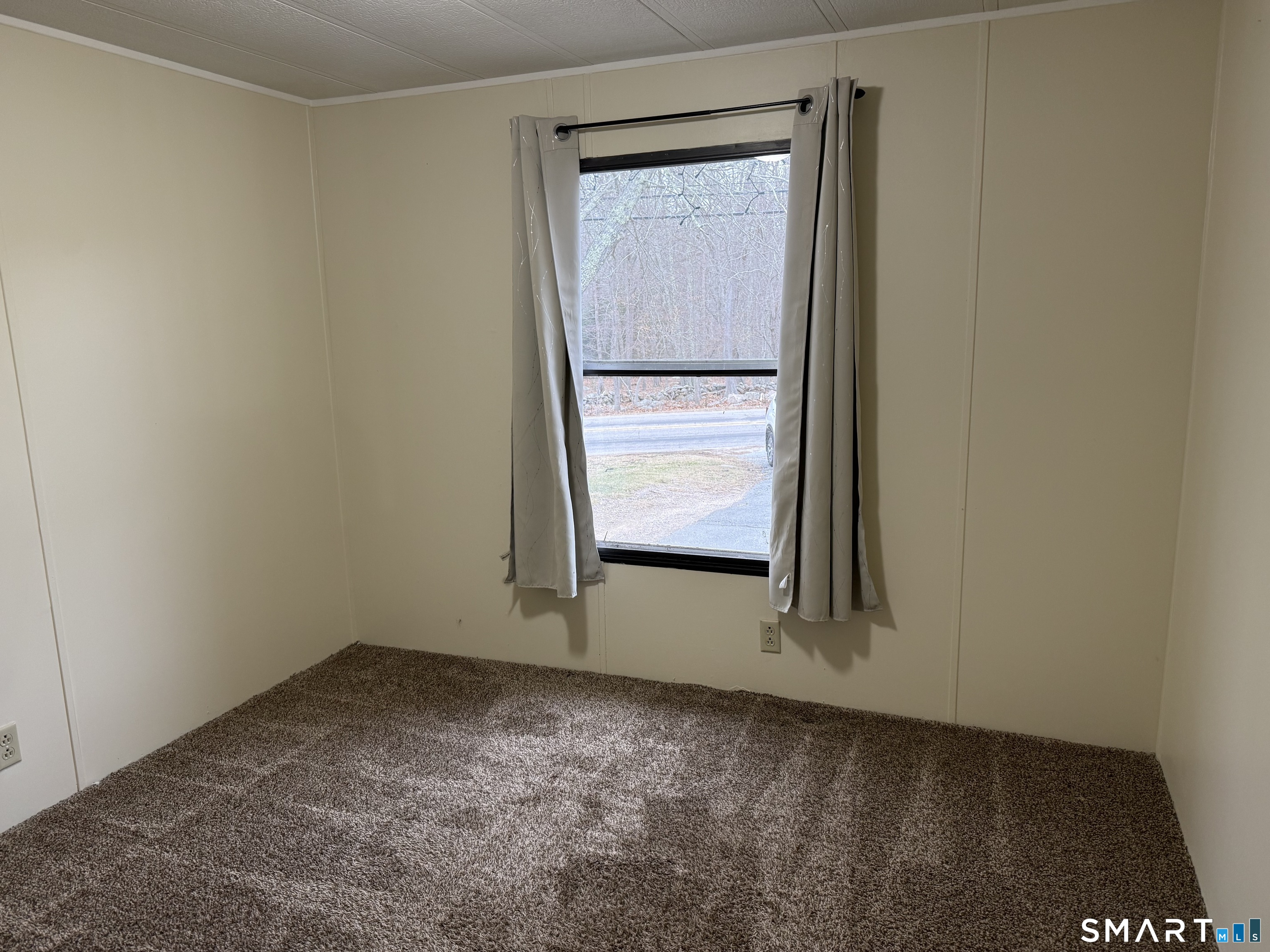 183 Whalehead Road Ledyard, CT 06335 - Photo 18 of 24 an empty room with windows