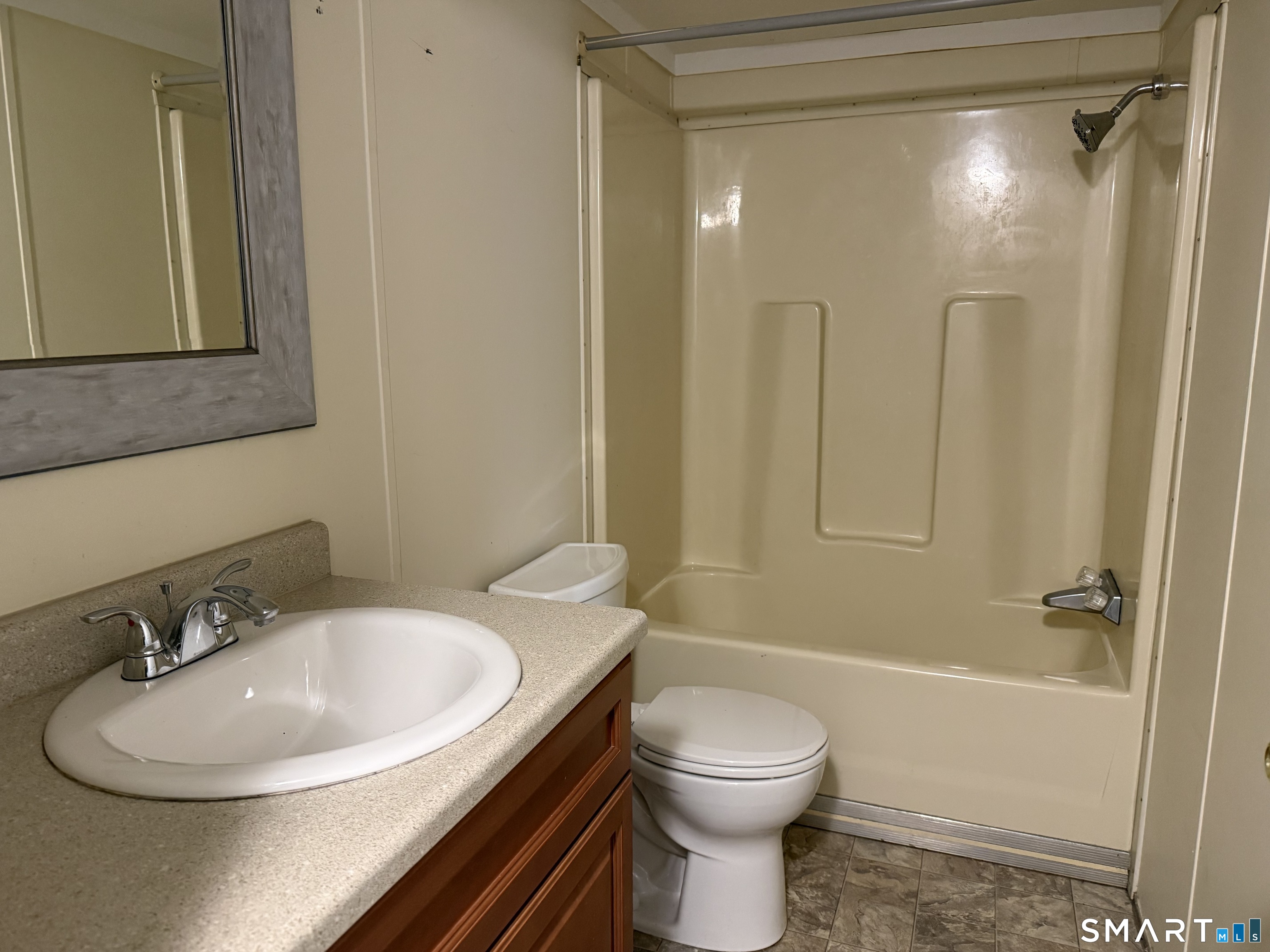183 Whalehead Road Ledyard, CT 06335 - Photo 20 of 24 a bathroom with a sink a toilet and shower