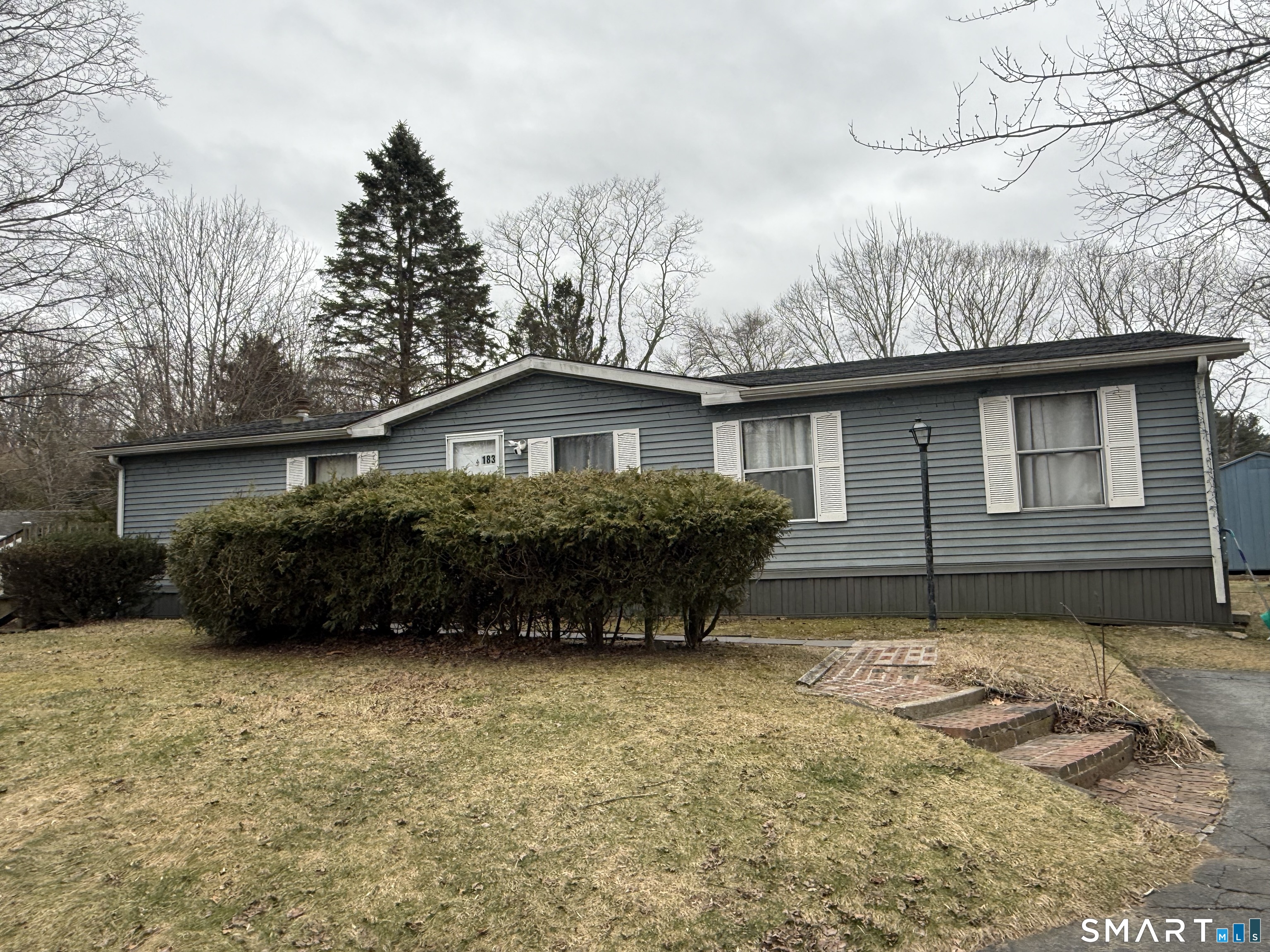 183 Whalehead Road Ledyard, CT 06335 - Photo 24 of 24 a view of a house with a yard