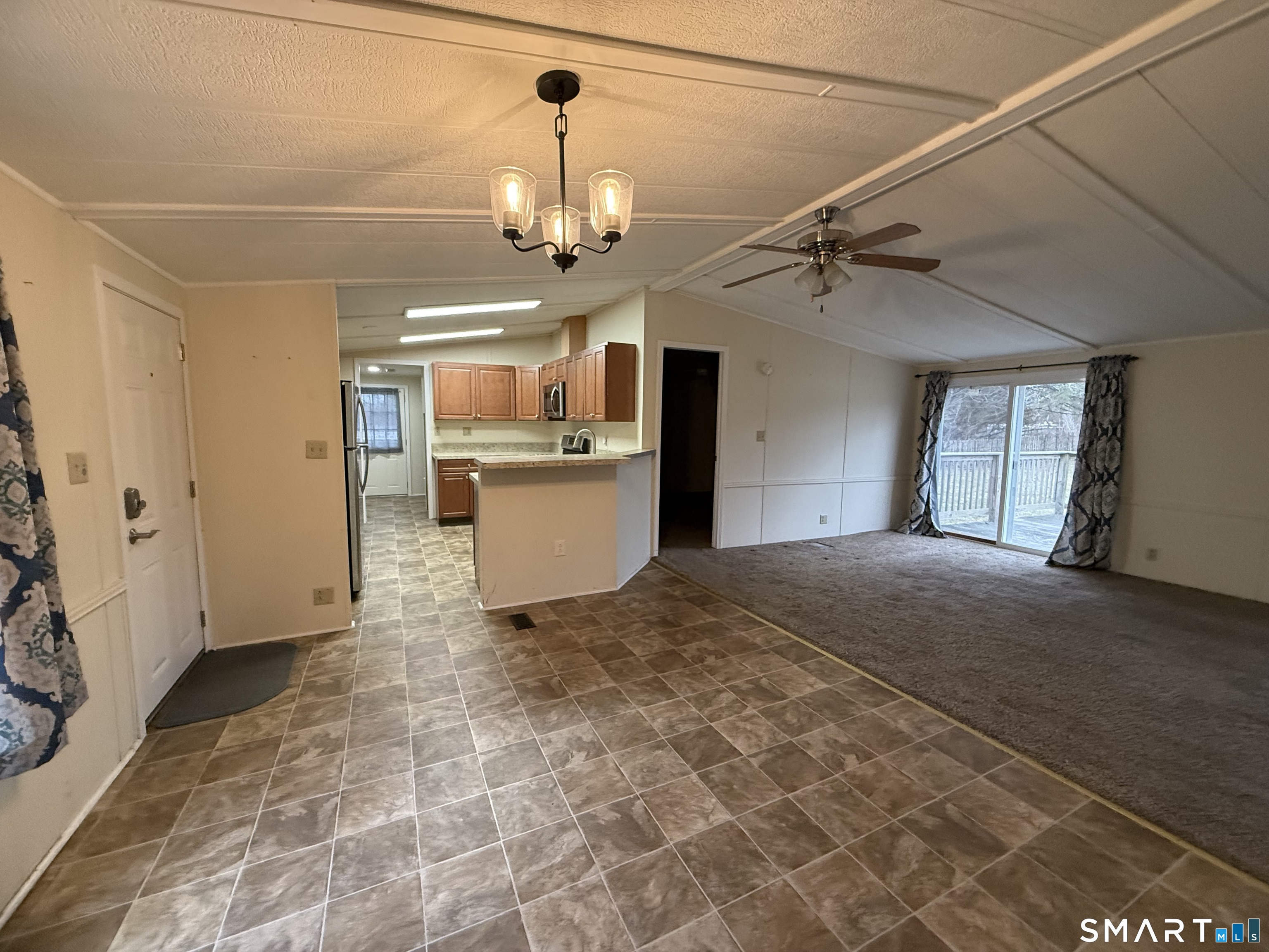 183 Whalehead Road Ledyard, CT 06335 - Photo 5 of 24 a view of a livingroom with a fireplace