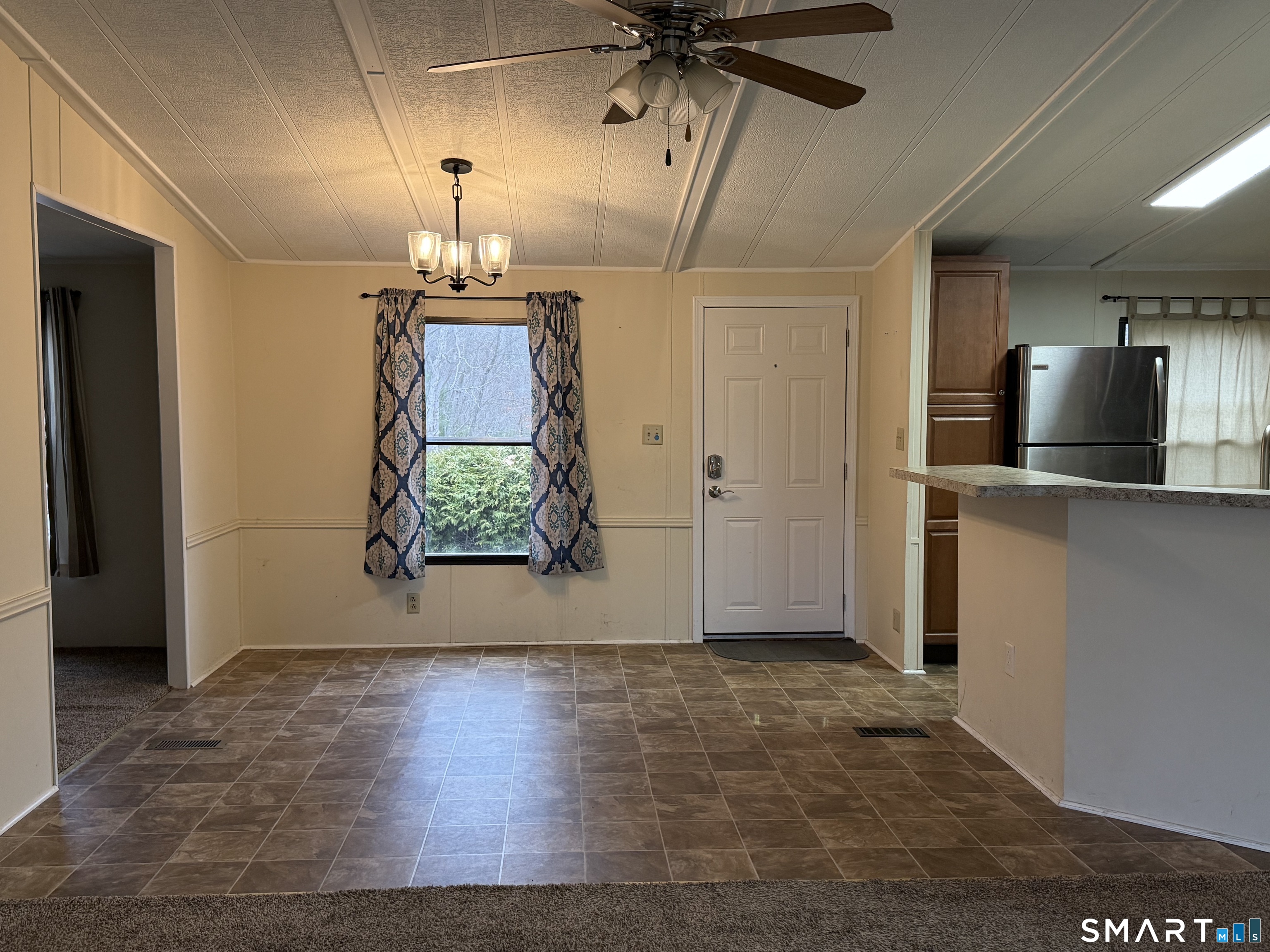 183 Whalehead Road Ledyard, CT 06335 - Photo 8 of 24 a view of a kitchen with a sink and cabinet area
