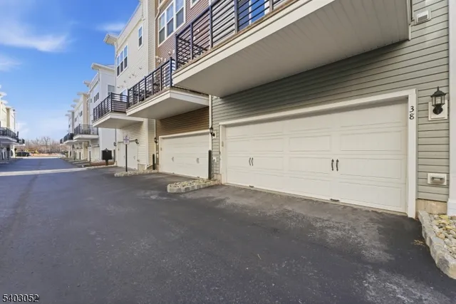 a view of a street with a building on the road