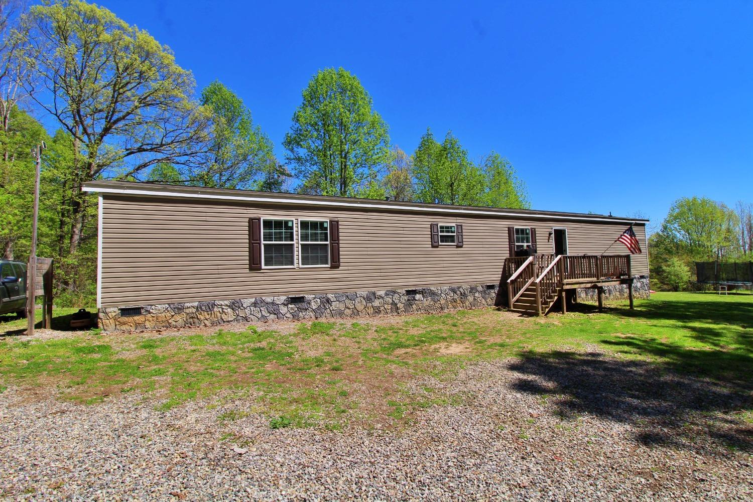 1104 Holiday Lake Road Pamplin, VA 23958 - Photo 1 of 19 a view of a house with backyard