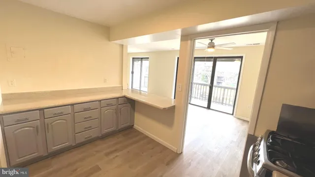 a view of an empty room and window