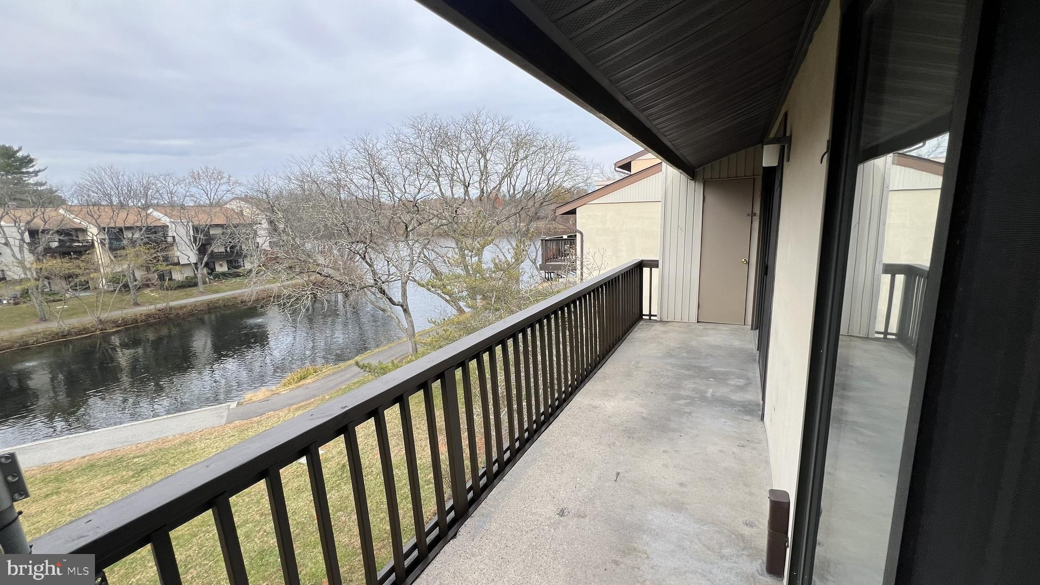 10073 Windstream Drive, Unit 5 Columbia, MD 21044 - Photo 2 of 17 a view of a balcony with an outdoor space