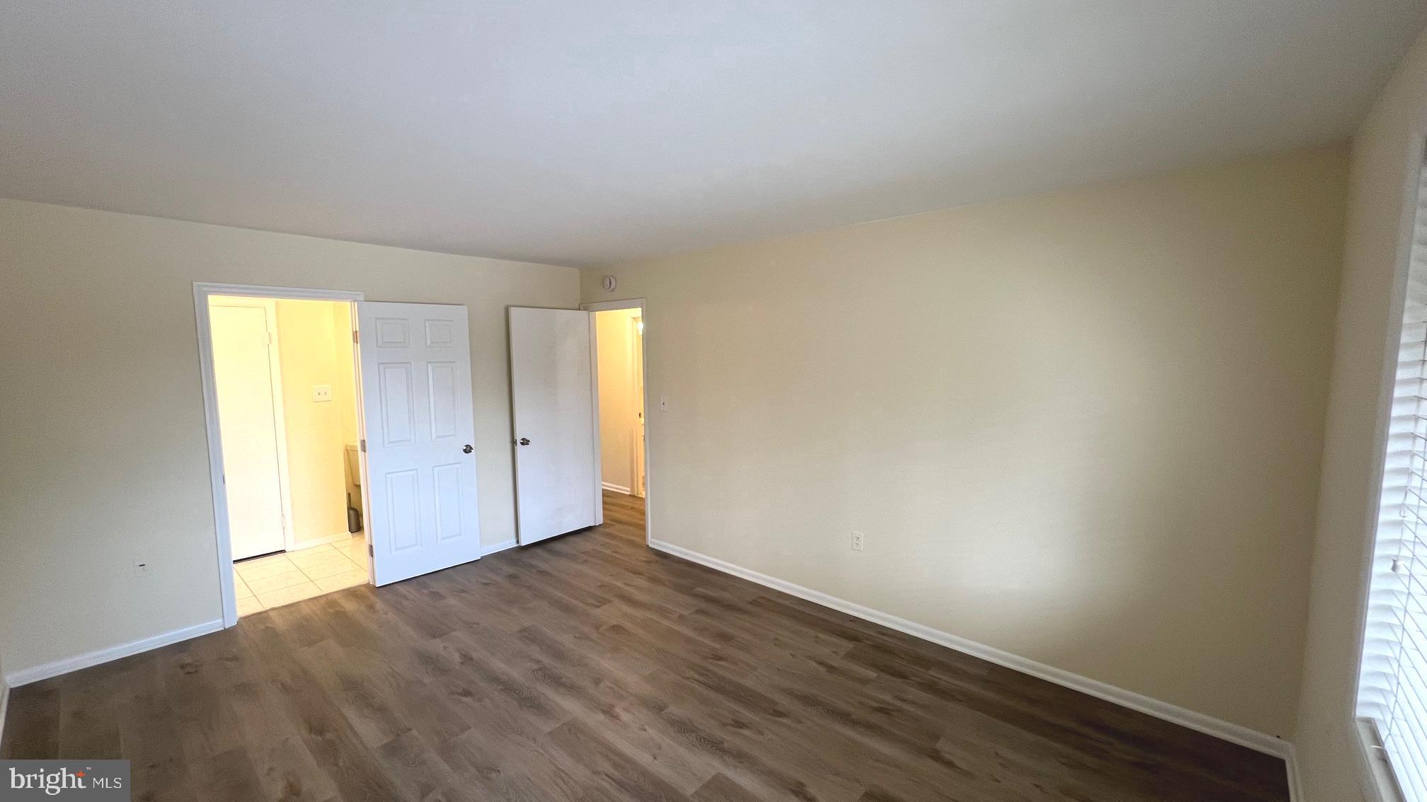 10073 Windstream Drive, Unit 5 Columbia, MD 21044 - Photo 10 of 17 a view of an empty room and window