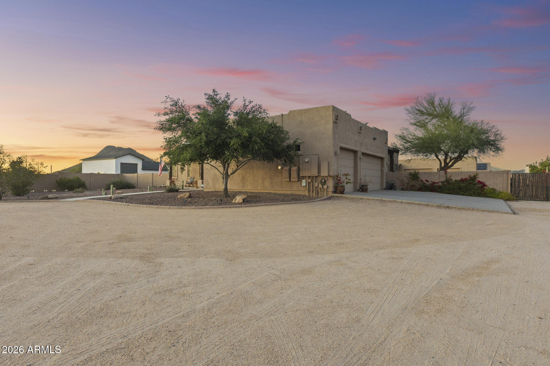 14526 West Jomax Road Surprise, AZ 85387 - Photo 10 of 57 a front view of a house with a yard and a garage