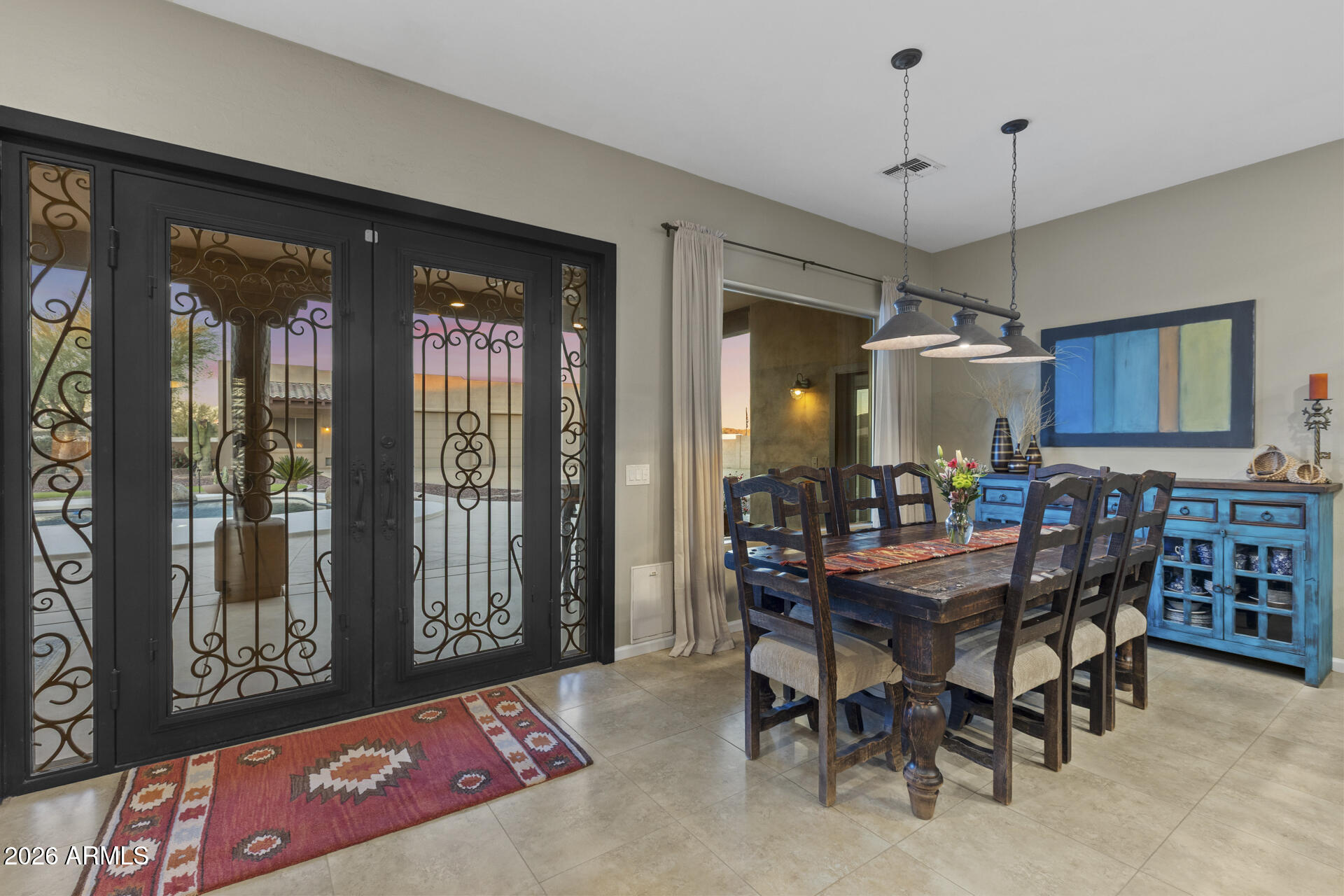 14526 West Jomax Road Surprise, AZ 85387 - Photo 19 of 57 a view of a dining room with furniture window and outside view