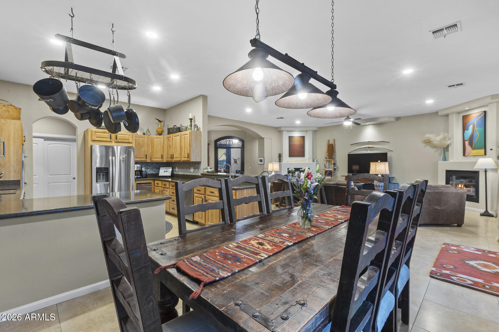 14526 West Jomax Road Surprise, AZ 85387 - Photo 20 of 57 a living room with lots of furniture and view of kitchen