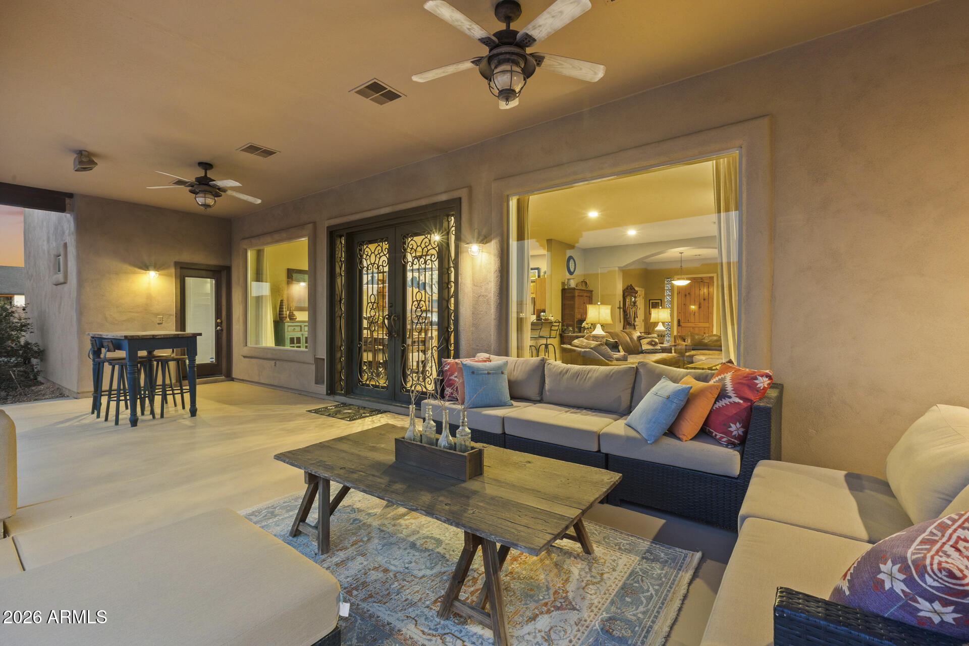 14526 West Jomax Road Surprise, AZ 85387 - Photo 35 of 57 a living room with furniture and a large window