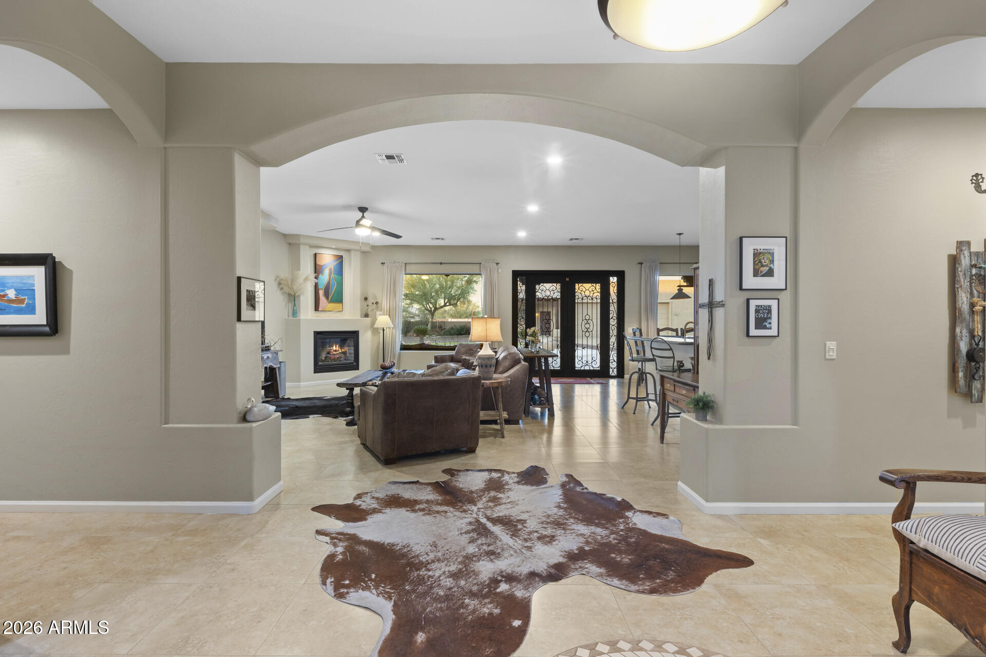 14526 West Jomax Road Surprise, AZ 85387 - Photo 3 of 57 a living room with furniture window and wooden floor