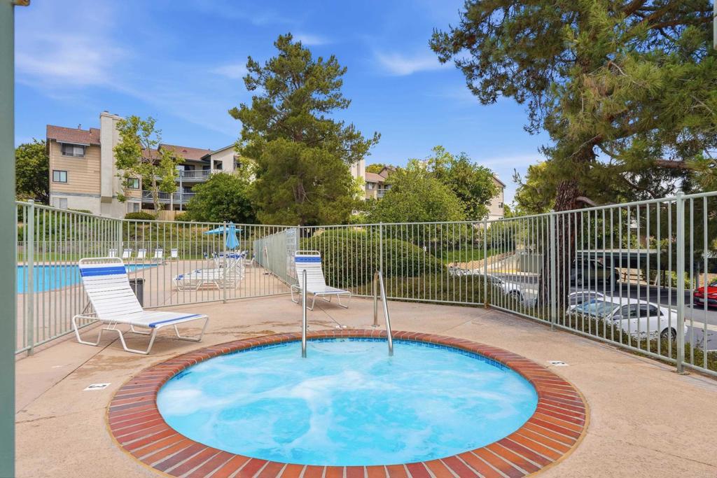 3051 Charwood Court Spring Valley, CA 91978 - Photo 17 of 20 a swimming pool with outdoor seating