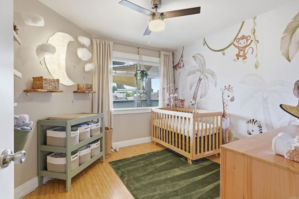 3051 Charwood Court Spring Valley, CA 91978 - Photo 6 of 20 a bedroom with furniture and a window