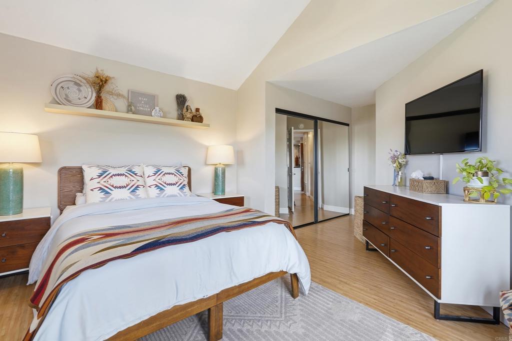 3051 Charwood Court Spring Valley, CA 91978 - Photo 10 of 20 a bedroom with a bed and a flat screen tv