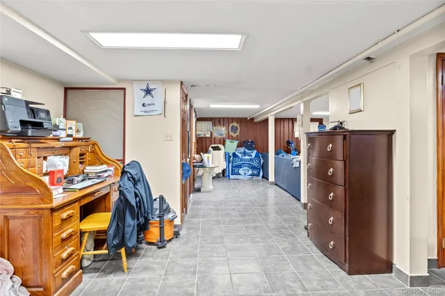 a kitchen with stainless steel appliances a refrigerator and a stove top oven