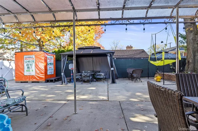 a view of path along with retail shop and outdoor seating