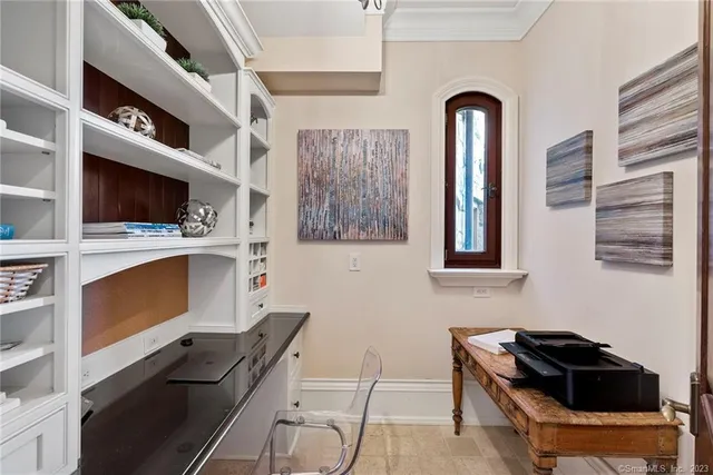 a kitchen with stainless steel appliances a stove a sink and a microwave