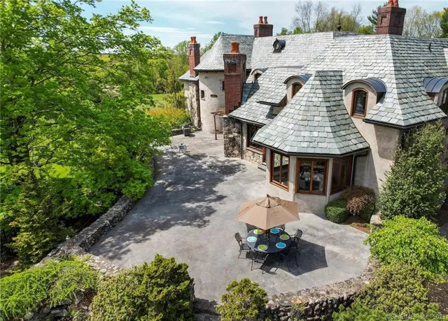 a view of a swimming pool with a patio