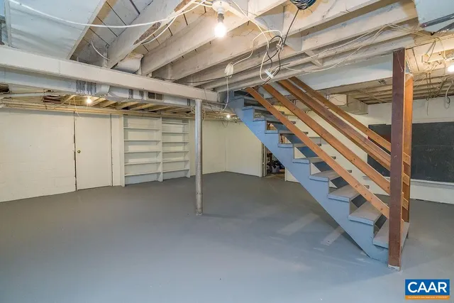 a view of empty room with wooden walls