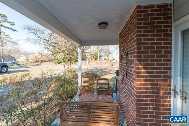 a view of a backyard and trees