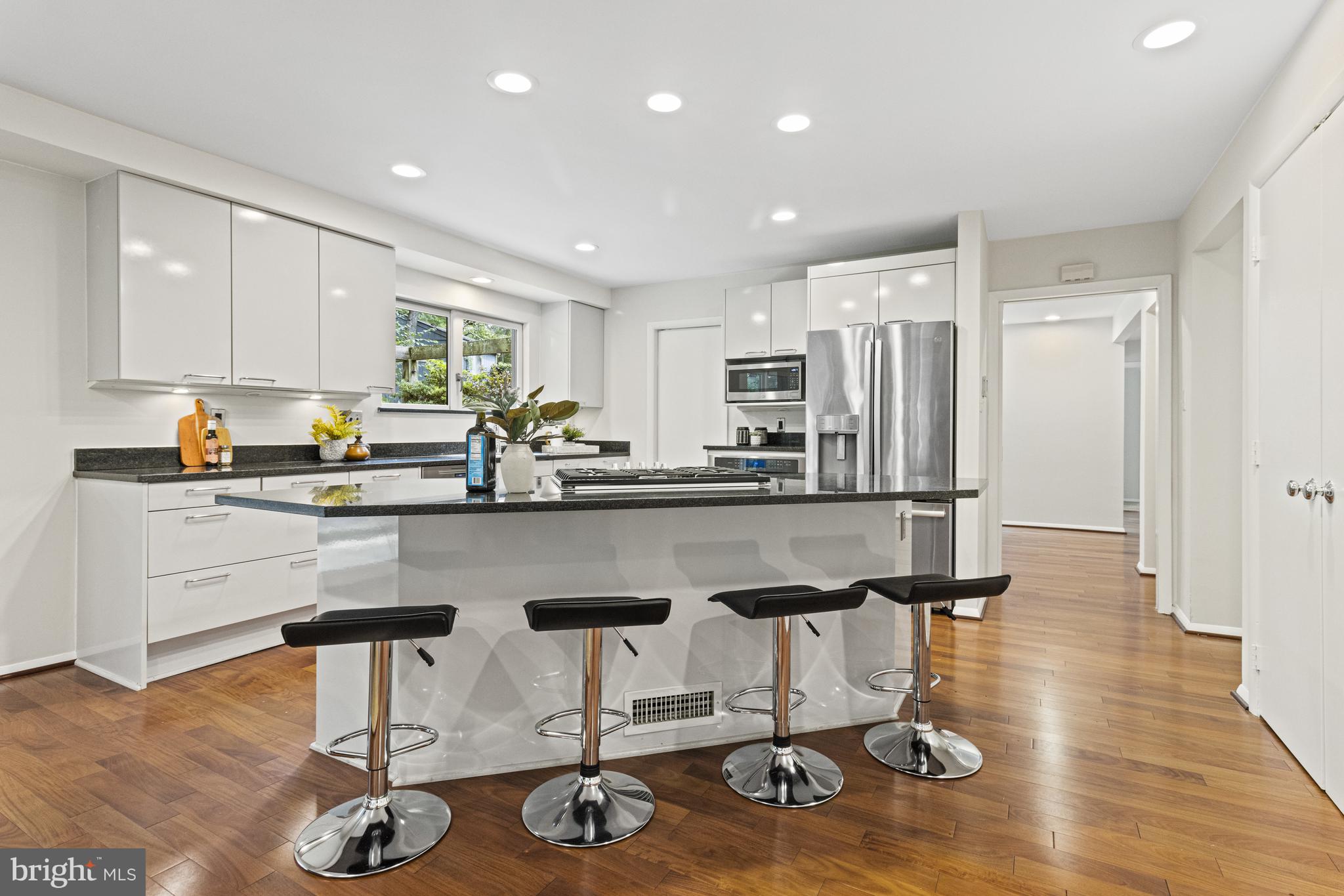 7107 Roxann Road Alexandria, VA 22315 - Photo 12 of 62 a kitchen with counter top space and appliances