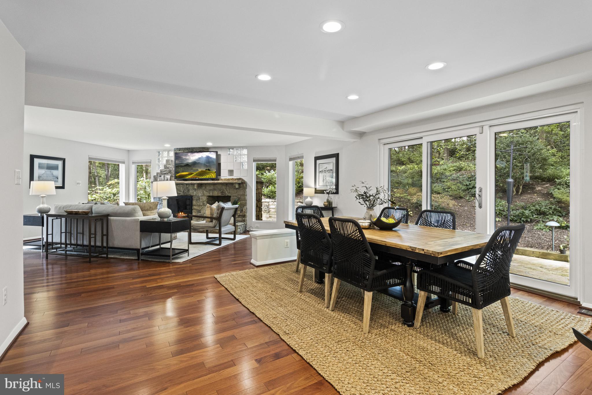 7107 Roxann Road Alexandria, VA 22315 - Photo 15 of 62 a view of a dining room with furniture window and wooden floor