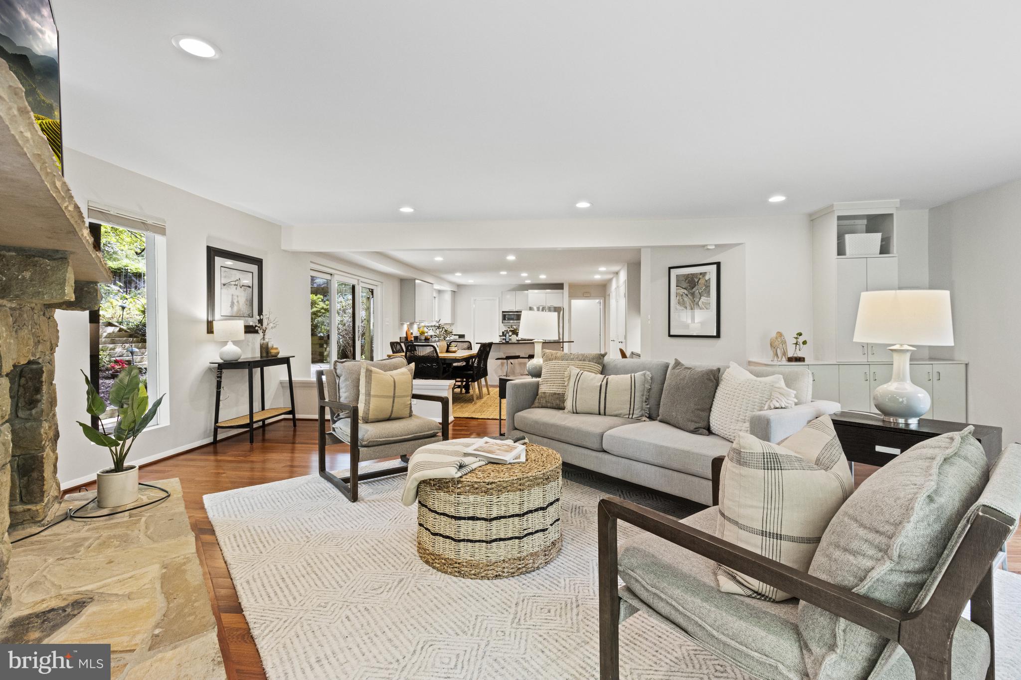 7107 Roxann Road Alexandria, VA 22315 - Photo 18 of 62 a living room with furniture and a wooden floor