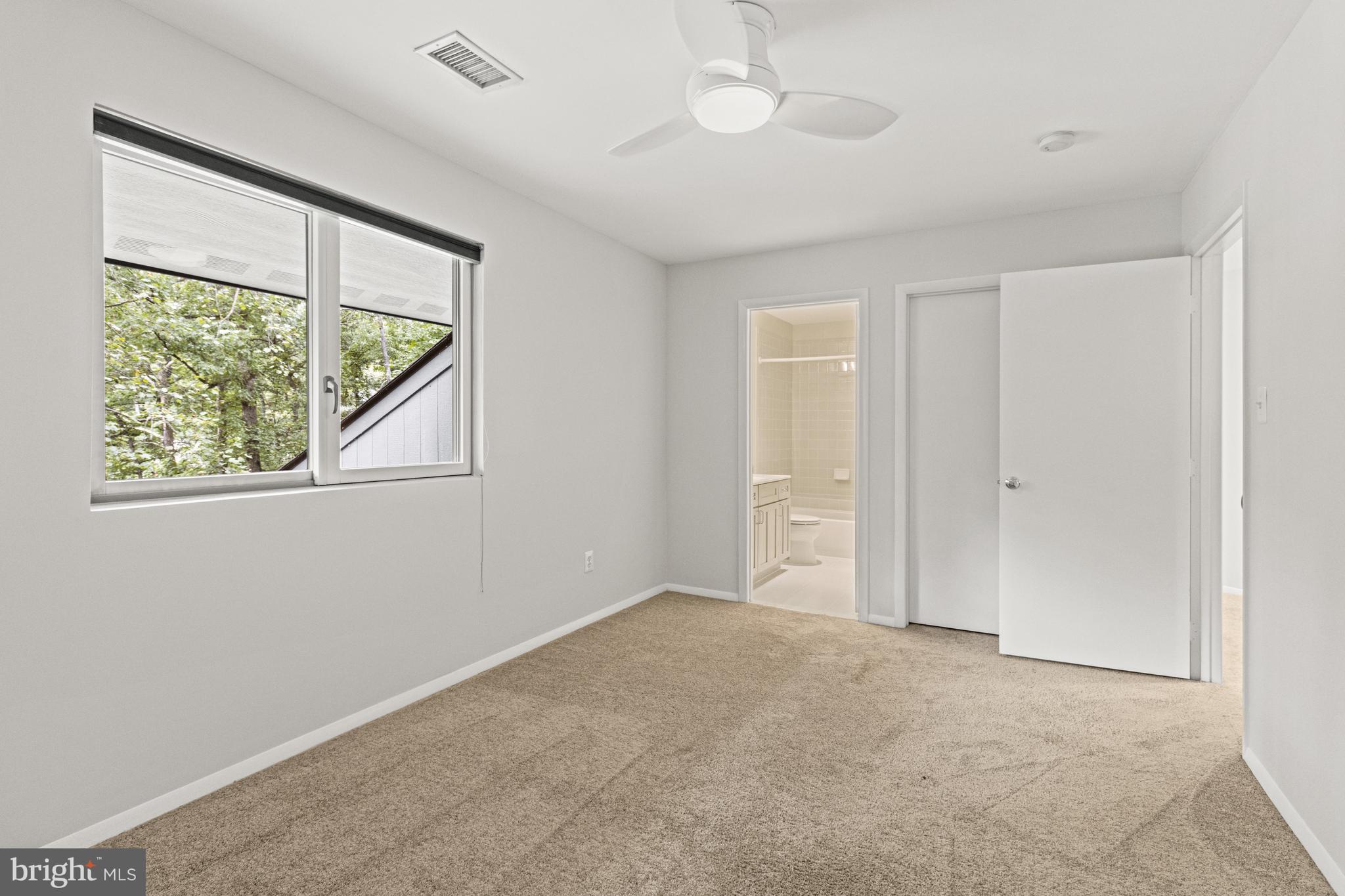 7107 Roxann Road Alexandria, VA 22315 - Photo 35 of 62 an empty room with a window